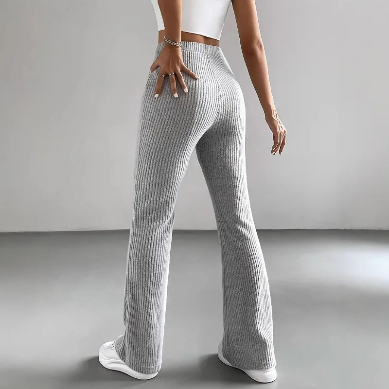Calças Bootcut Caneladas em Malha