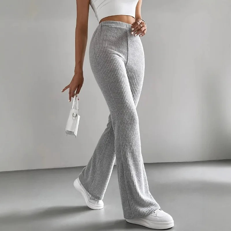 Calças Bootcut Caneladas em Malha