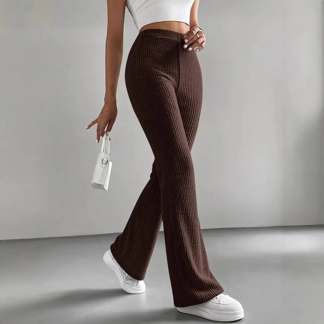 Calças Bootcut Caneladas em Malha