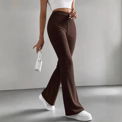 Calças Bootcut Caneladas em Malha