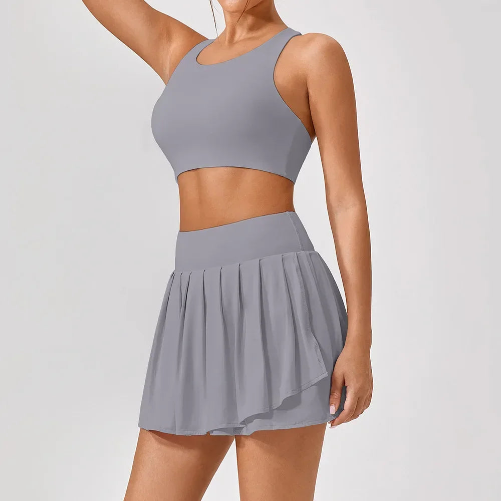 Conjunto Desportivo 2/3 Peças com Saia Plissada